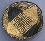 A ply-split basket with cords made from Wraphia II paper ribbon