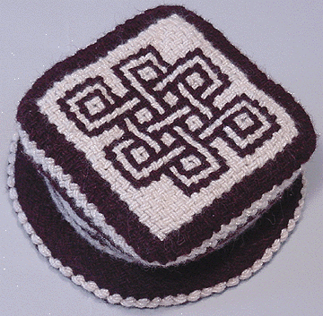 [TLOI hat with eternal knot design -- top view]